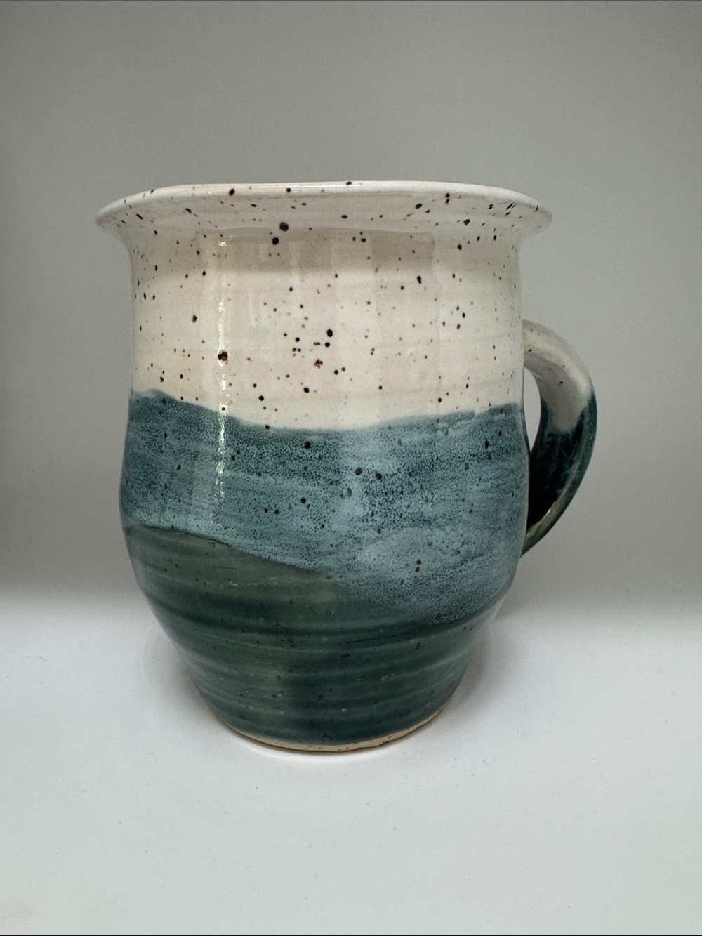 Handmade Ceramic Mug in speckled white and teal green glaze